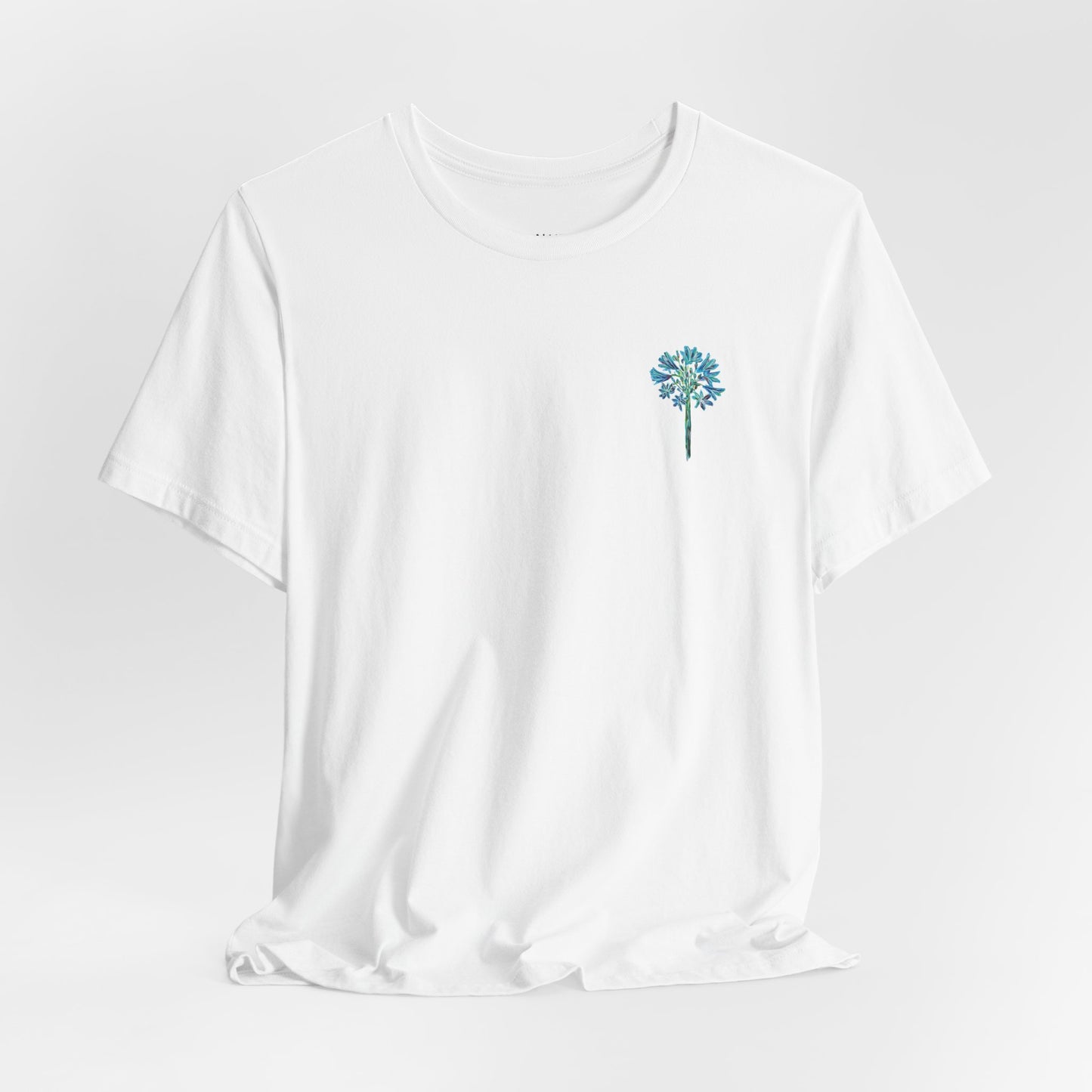 White t-shirt with a blue allium design on a light grey background