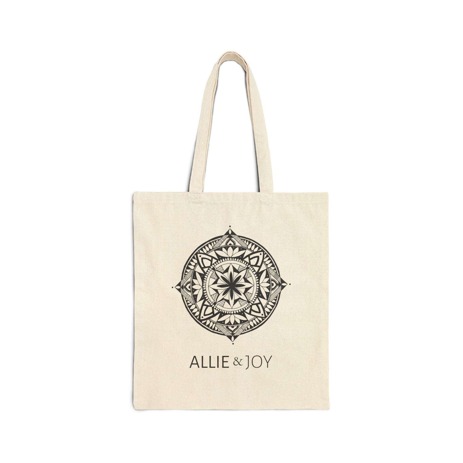 Beige tote bag with decorative mandala emblem and 'Allie & Joy' logo text on a white background